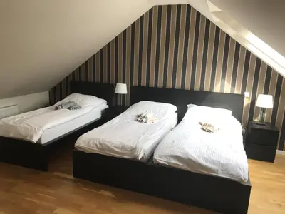 Łóżko lub łóżka w pokoju w obiekcie Apartament Beige