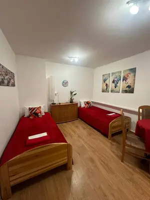Łóżko lub łóżka w pokoju w obiekcie Travel House Wroclaw