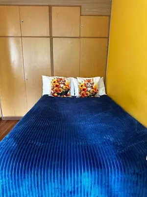 Łóżko lub łóżka w pokoju w obiekcie Travel House Wroclaw