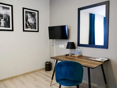 Telewizja i/lub zestaw kina domowego w obiekcie Aroma Stone Hotel Spa