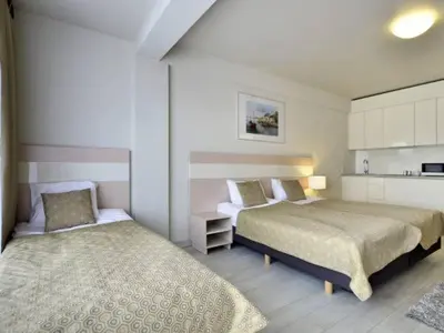 Łóżko lub łóżka w pokoju w obiekcie Apartament Czarna Góra