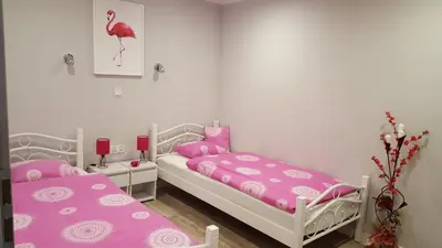 Łóżko lub łóżka w pokoju w obiekcie Apartament Grosik