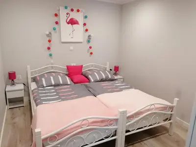 Łóżko lub łóżka w pokoju w obiekcie Apartament Grosik