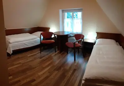 Łóżko lub łóżka w pokoju w obiekcie Na Skraju