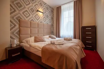 Łóżko lub łóżka w pokoju w obiekcie OW Sorrento
