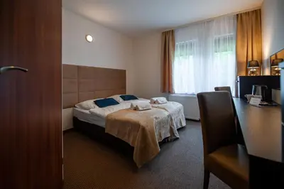Łóżko lub łóżka w pokoju w obiekcie OW Sorrento