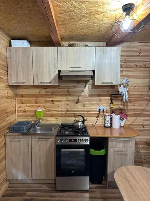 Kuchnia lub aneks kuchenny w obiekcie Domek pod Czarną Górą