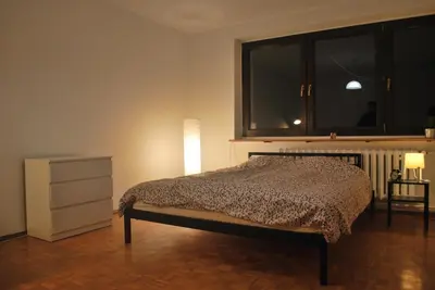 Łóżko lub łóżka w pokoju w obiekcie Pokoje nad Starą Odrą - Zacisze