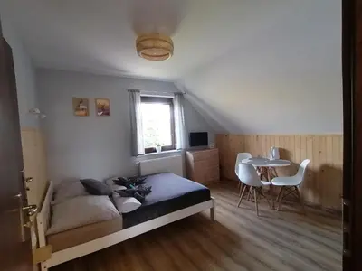 Łóżko lub łóżka w pokoju w obiekcie Pokoje Przy Polanie
