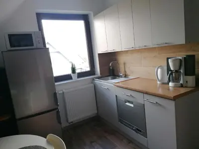 Kuchnia lub aneks kuchenny w obiekcie Pokoje Przy Polanie