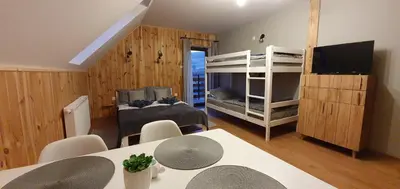 Łóżko lub łóżka w pokoju w obiekcie Pokoje Przy Polanie