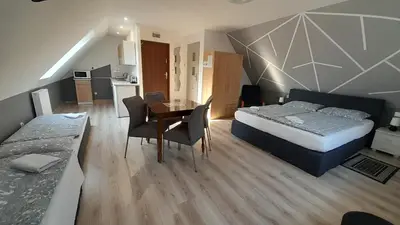 Łóżko lub łóżka w pokoju w obiekcie Apartament 