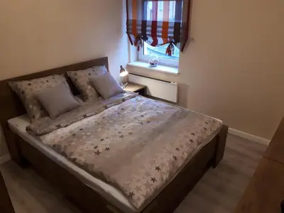 Łóżko lub łóżka w pokoju w obiekcie Apartament Natalia
