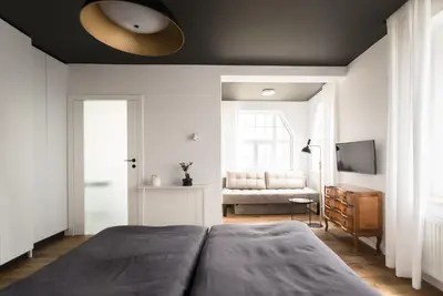Łóżko lub łóżka w pokoju w obiekcie Kolorowe Pola Boutique B&B