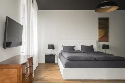 Łóżko lub łóżka w pokoju w obiekcie Kolorowe Pola Boutique B&B