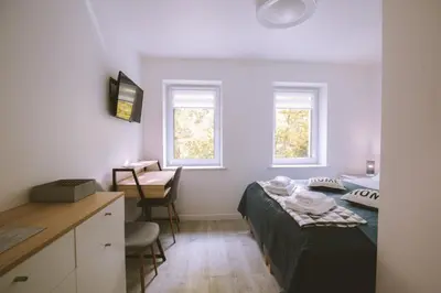 Łóżko lub łóżka w pokoju w obiekcie Pokoje Na Szlaku