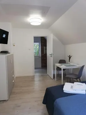 Telewizja i/lub zestaw kina domowego w obiekcie Pokoje Na Szlaku