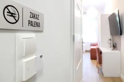Telewizja i/lub zestaw kina domowego w obiekcie Dworek Różany Hotel & Restauracja