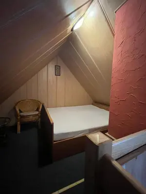 Łóżko lub łóżka w pokoju w obiekcie Wilinianka
