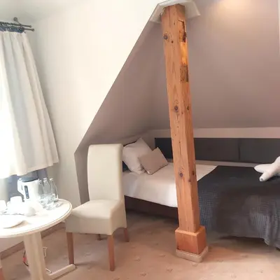 Łóżko lub łóżka w pokoju w obiekcie Villa Lessing