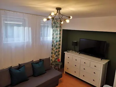 Telewizja i/lub zestaw kina domowego w obiekcie Apartament Zielony Zdrój