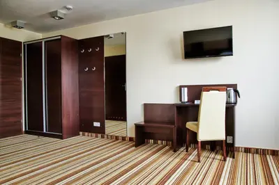 Telewizja i/lub zestaw kina domowego w obiekcie Boutique Hotel's Kwiska - Legnicka