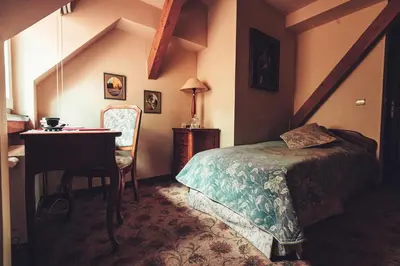 Łóżko lub łóżka w pokoju w obiekcie Willa Barbara Lądek Zdrój
