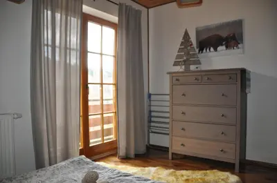 Łóżko lub łóżka w pokoju w obiekcie Dom Trzech Braci