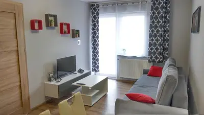 Telewizja i/lub zestaw kina domowego w obiekcie Apartament Marzenie 6 - Opole