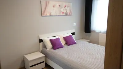 Łóżko lub łóżka w pokoju w obiekcie Apartament Marzenie 6 - Opole