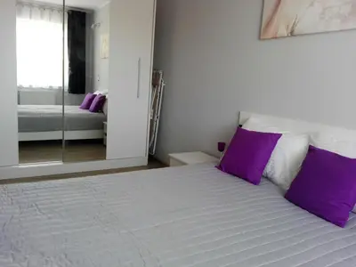 Łóżko lub łóżka w pokoju w obiekcie Apartament Marzenie 6 - Opole
