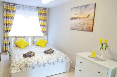 Łóżko lub łóżka w pokoju w obiekcie Grey Rooms