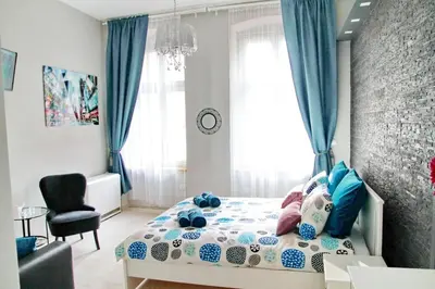 Łóżko lub łóżka w pokoju w obiekcie Grey Rooms