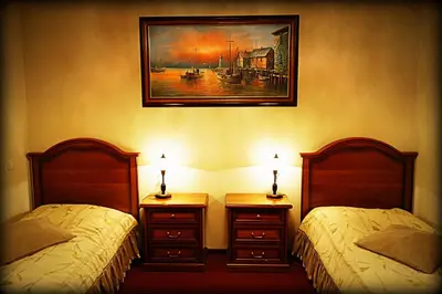 Łóżko lub łóżka w pokoju w obiekcie Hotel Zaodrze
