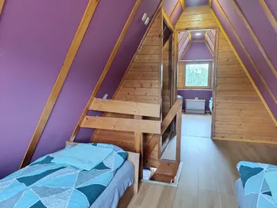 Łóżko lub łóżka w pokoju w obiekcie Ośrodek Szkoleniowo - Wypoczynkowy 