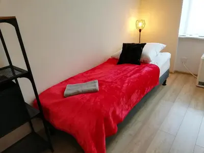 Łóżko lub łóżka w pokoju w obiekcie Apartament Miarki