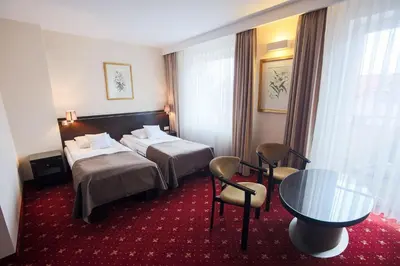 Łóżko lub łóżka w pokoju w obiekcie Restauracja Hotel VIP