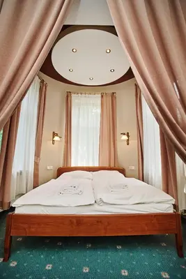 Łóżko lub łóżka w pokoju w obiekcie Park Hotel