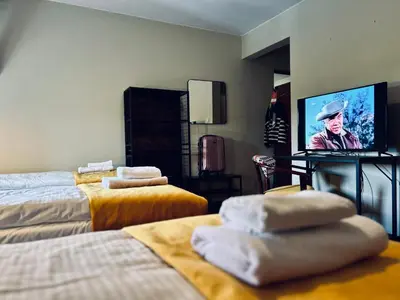 Telewizja i/lub zestaw kina domowego w obiekcie Park Hotel
