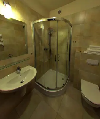 Łazienka w obiekcie Hotel Camelot