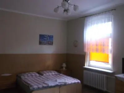 Łóżko lub łóżka w pokoju w obiekcie Góściniec Iwona