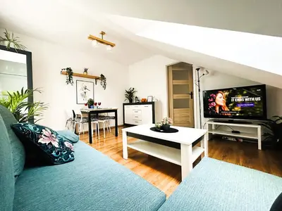 Telewizja i/lub zestaw kina domowego w obiekcie Apartament Słoneczny 1