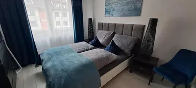 Łóżko lub łóżka w pokoju w obiekcie Apartament-Sweet Night