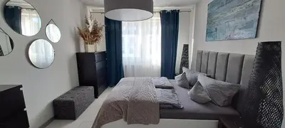 Łóżko lub łóżka w pokoju w obiekcie Apartament-Sweet Night