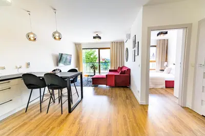 Łóżko lub łóżka w pokoju w obiekcie About Art Apartments