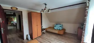 Łóżko lub łóżka w pokoju w obiekcie AGROTURYSTYKA RASZKÓW
