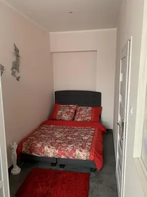 Łóżko lub łóżka w pokoju w obiekcie Sanktuarium Snu Apartments