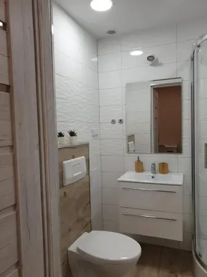 Łazienka w obiekcie Sanktuarium Snu Apartments