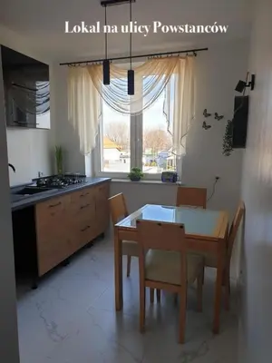 Kuchnia lub aneks kuchenny w obiekcie Sanktuarium Snu Apartments