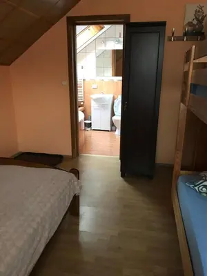 Łóżko lub łóżka w pokoju w obiekcie Nad Sowiogorskim Potokiem